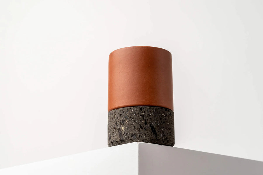 Mezcalitos barro clay cups stone base close-up