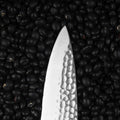 Detail of cherry-wood handle on KOTAI Gyuto chef knife