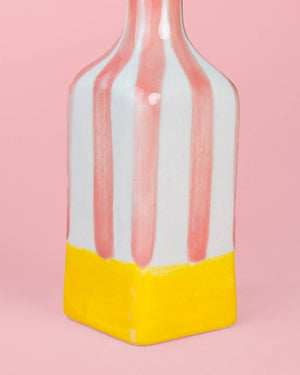 Ceramic oil bottle yellow pink handcrafted top view